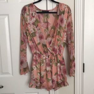 Deep V, sheer back floral romper.